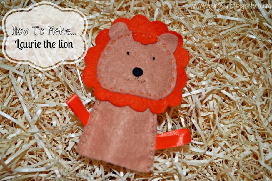 A teddy bear sitting on top of a pile of hay