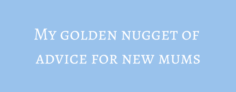 A young child smiling at the camera