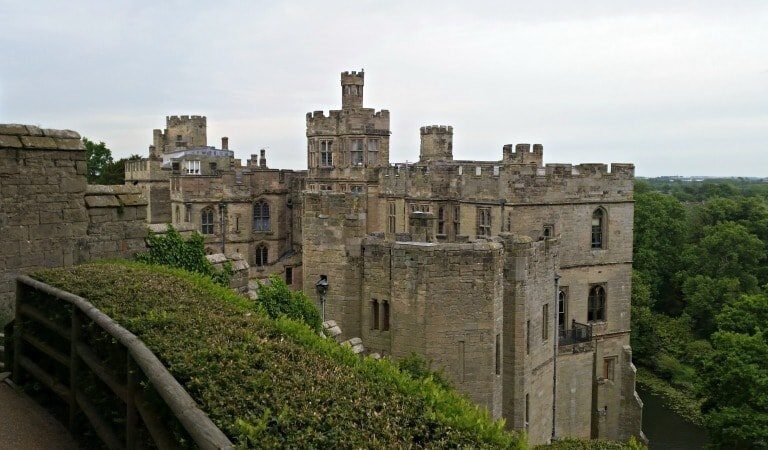 A castle sitting on the side of a building