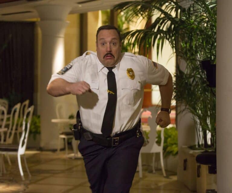 Kevin James standing in a room