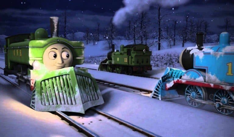 A train cake sitting on top of a table