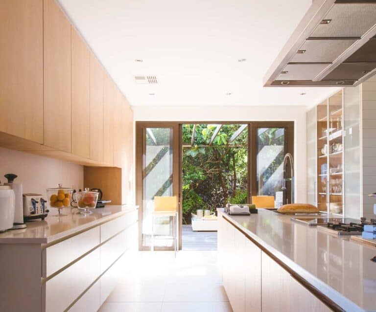 A kitchen with a sink and a window
