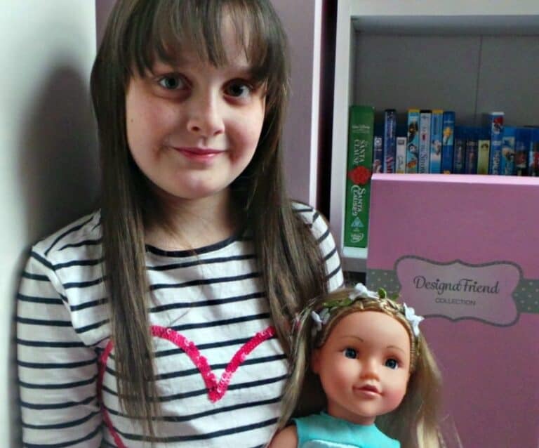 A little girl posing for a picture