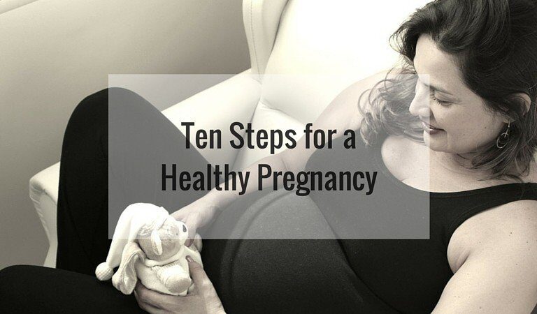 A woman sitting on a bed