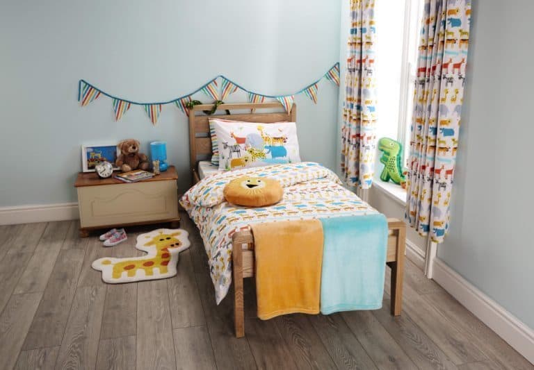 A bedroom with a stuffed animal