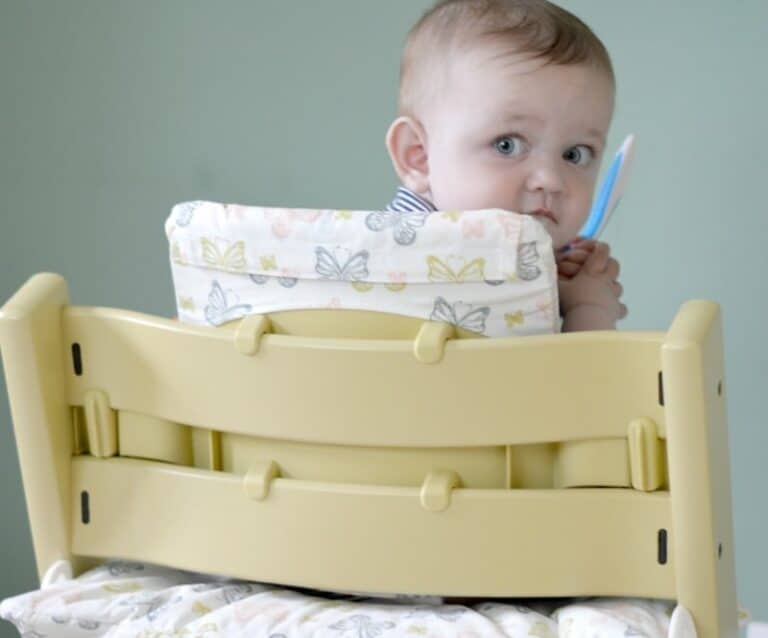 A baby sitting on a table