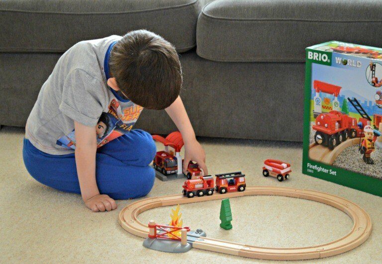 A little boy sitting on a table
