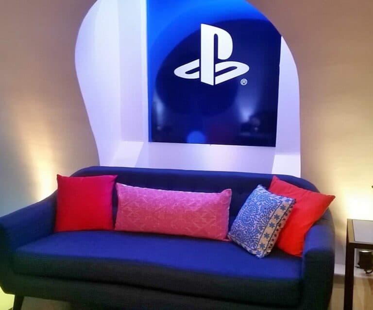 A living room with a blue chair