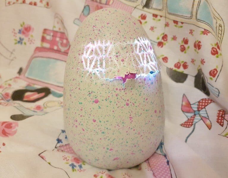 A stuffed animal on a bed