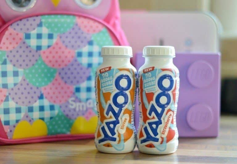 A cup of coffee on a table, with Roo and Sugar