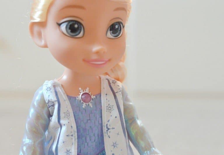 A close up of a toy doll