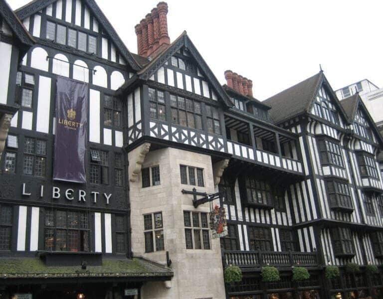 A sign on the side of Liberty