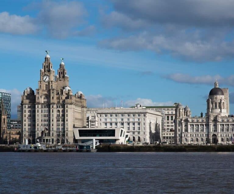A large body of water with a city in the background
