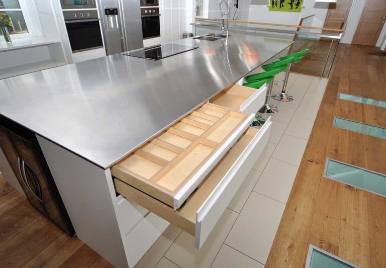 A kitchen with a wood floor