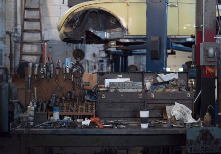 A kitchen with a building in the background