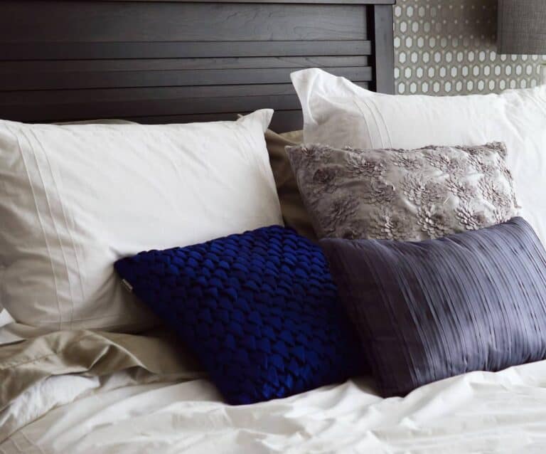 A made bed in a hotel room
