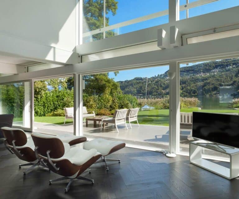 A living room filled with furniture and a large window