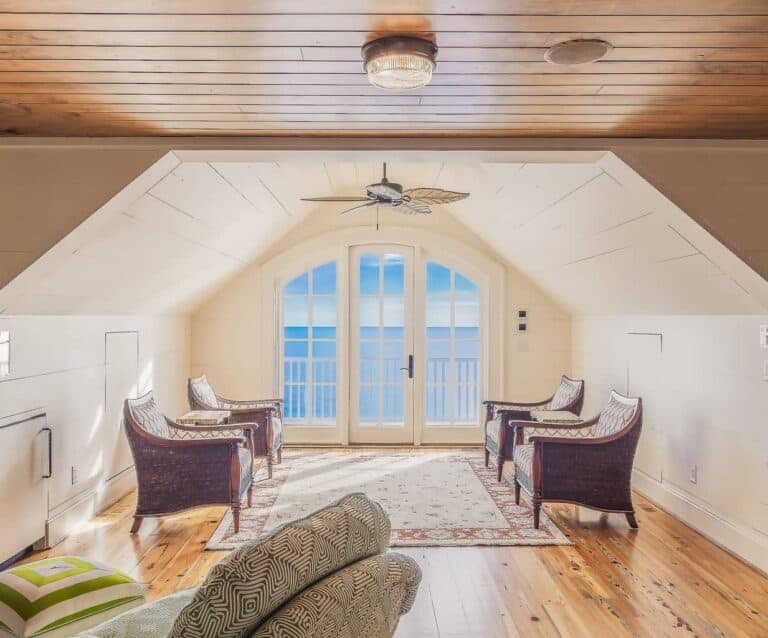 A living room filled with furniture and a fireplace