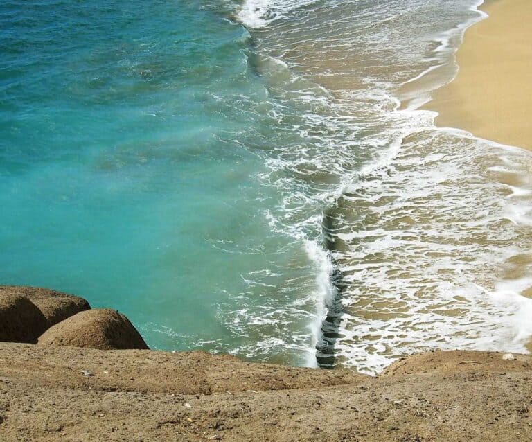 A body of water next to the ocean