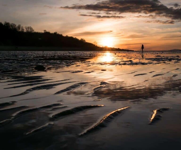 A sunset over a body of water