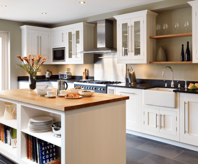 A kitchen with a sink and a window