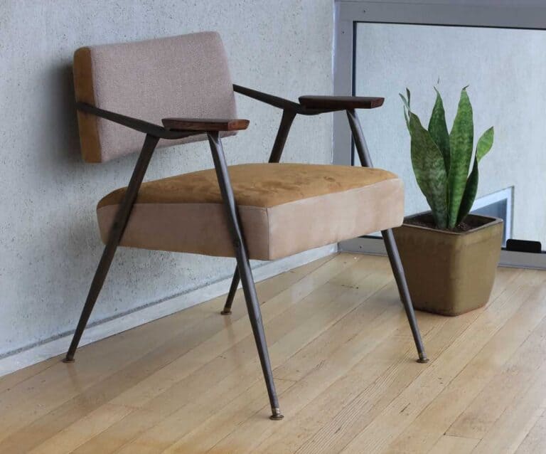 A chair sitting in front of a wooden table