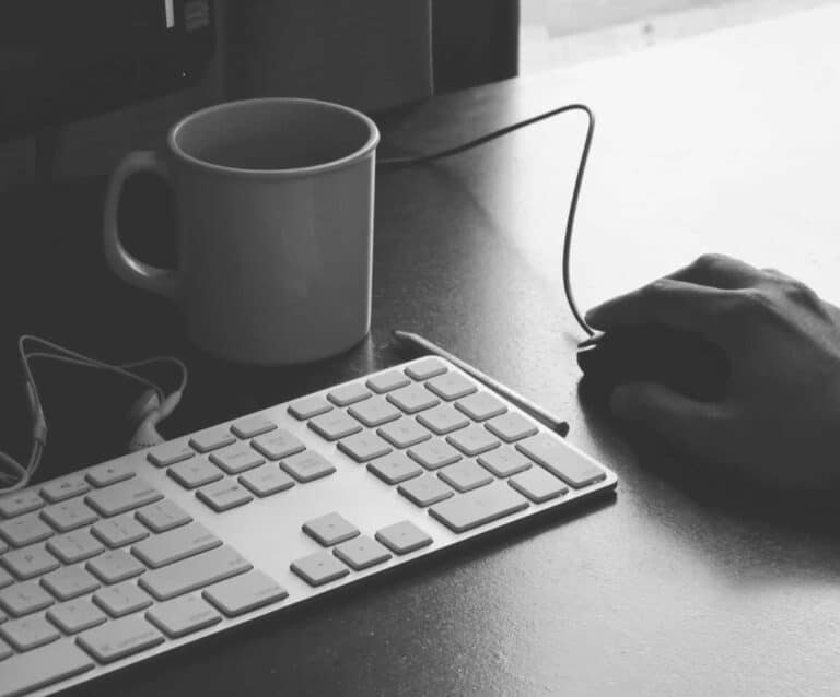 A close up of a laptop computer sitting on top of a desk
