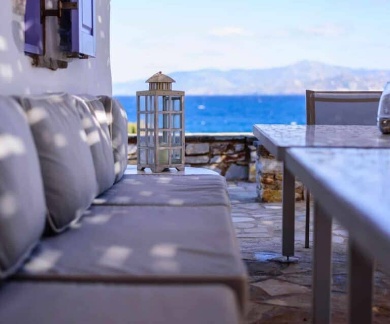 A chair sitting in front of a building