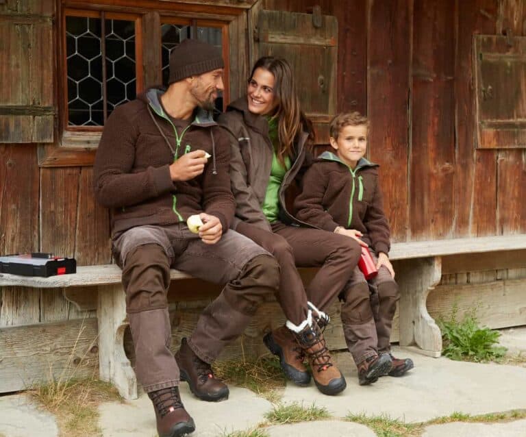 A man and a woman sitting on a bench