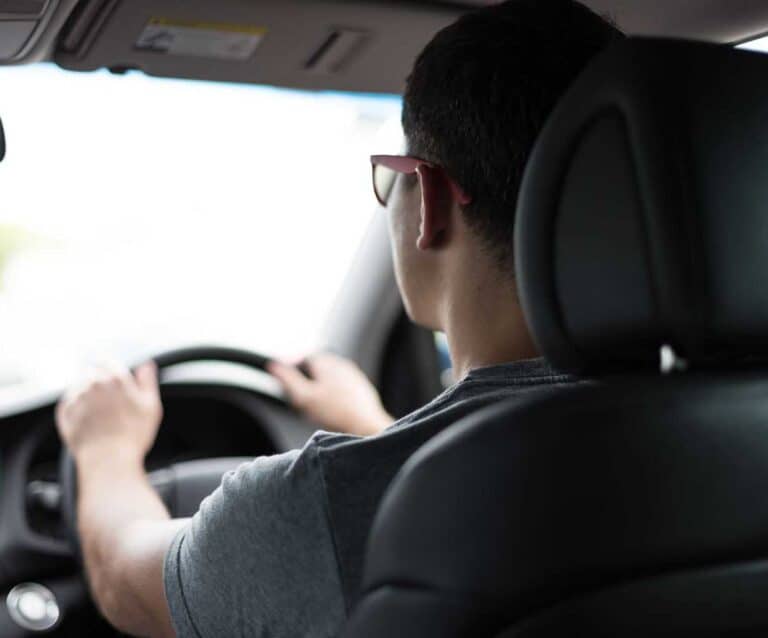 A man driving a car