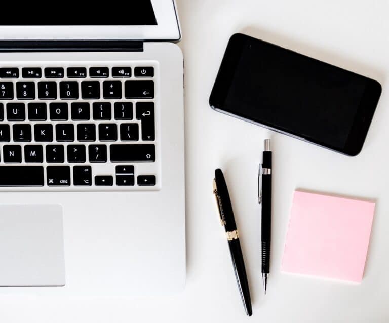 A laptop computer sitting on top of a table