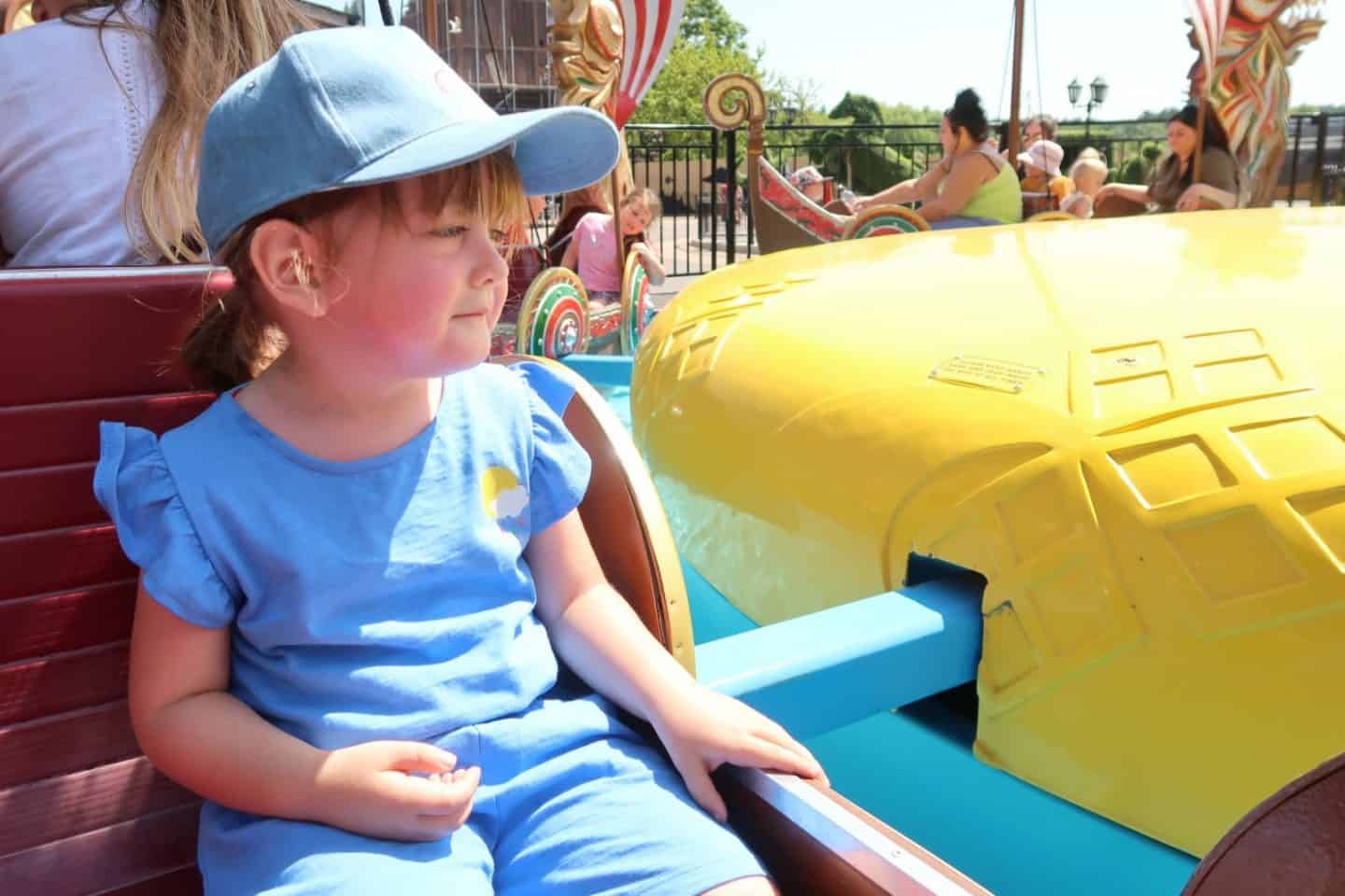 A young child sitting in a chair