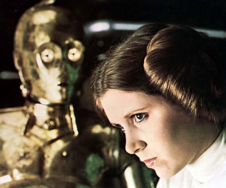 A person in glasses looking at the camera