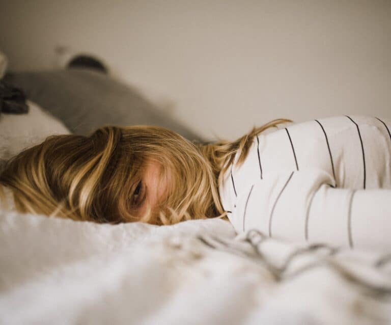 A woman lying on a bed