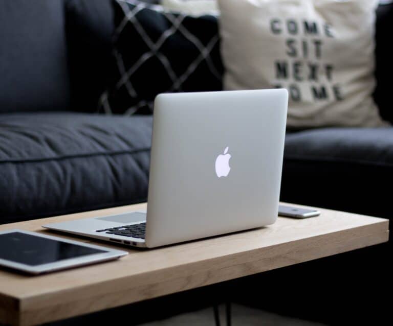 A laptop computer sitting on top of a table