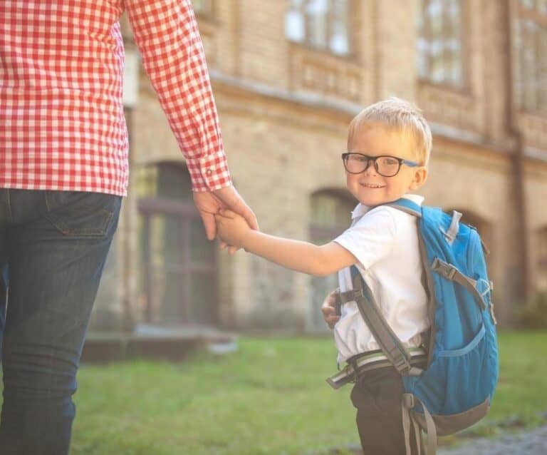 A person standing in front of a building