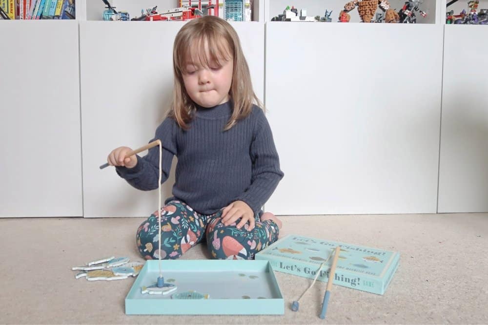 A girl sitting on a table