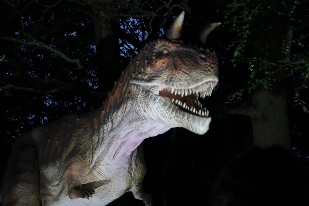 A dinosaur with its mouth open