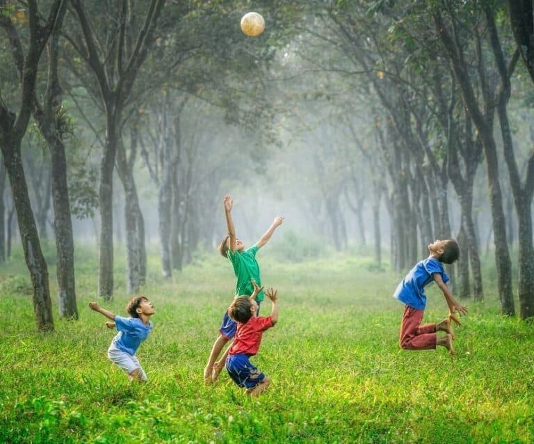 A little girl playing with a kite