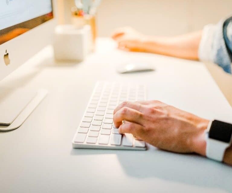 A person using a laptop computer