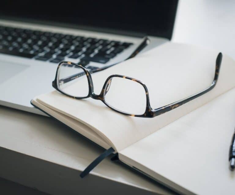 A laptop computer sitting on top of a table