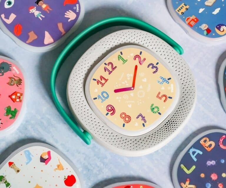 A group of plastic clock on a table