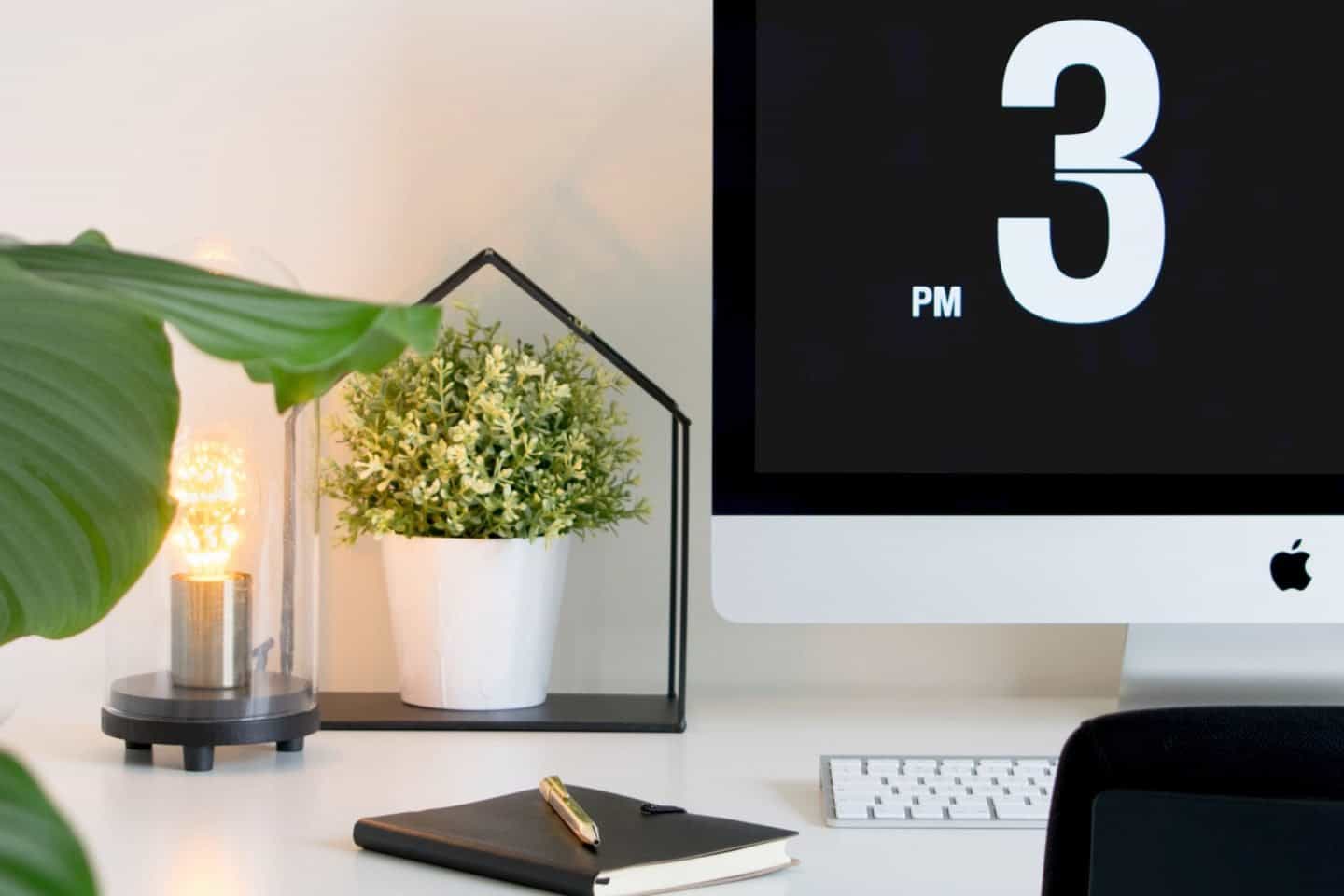 A desktop computer monitor sitting on top of a desk