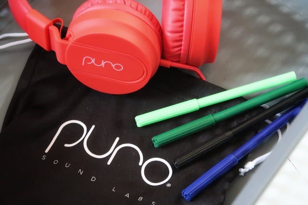 PuroBasic Volume Limiting Wired Headphones for Kids
A plastic container on a table