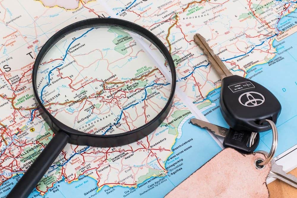 3 Important Things To Consider When House Hunting
A magnifying glass on a table, with Location and Map