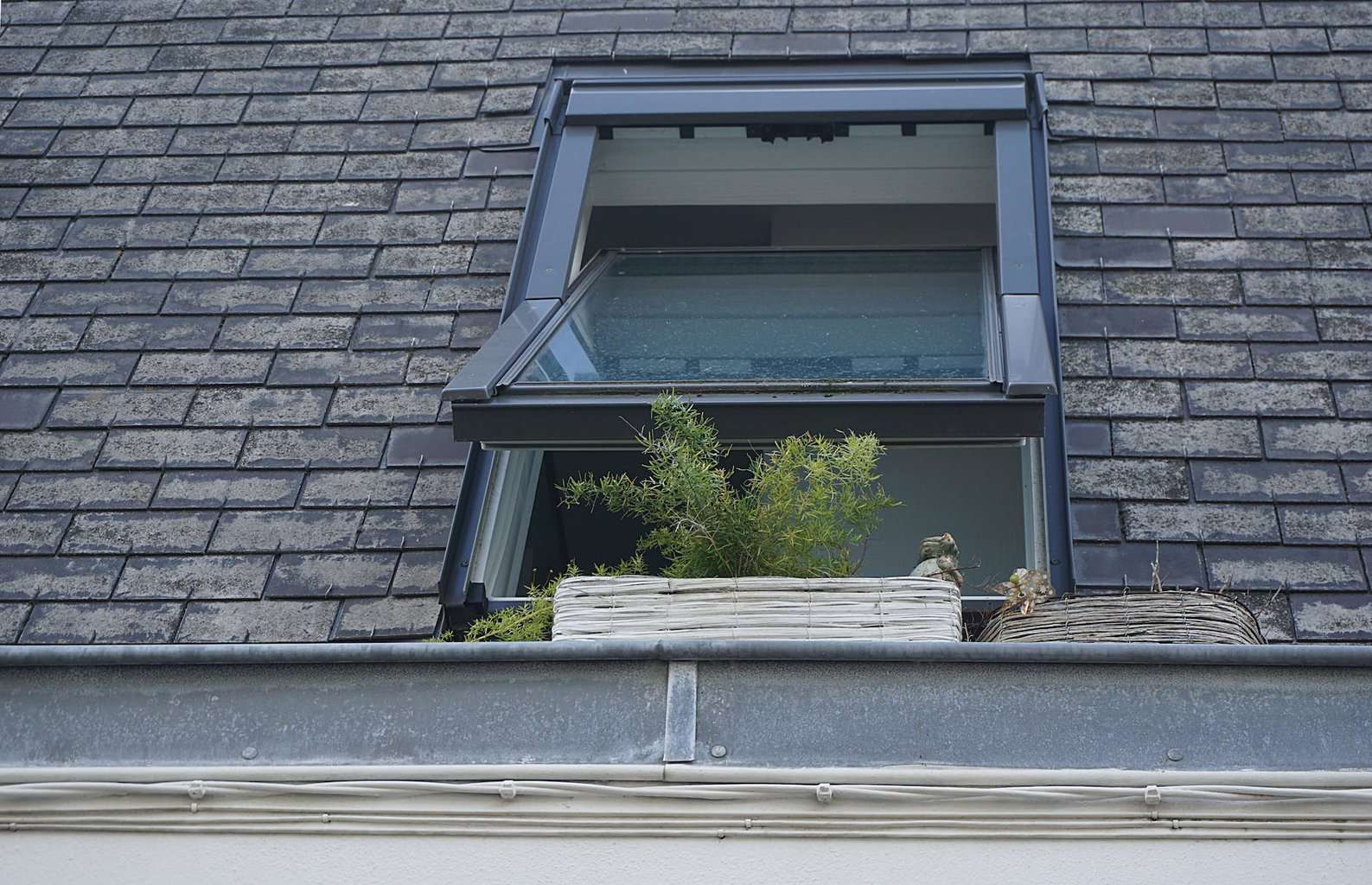 clear glass window open - What is the Most Durable Roofing Repair Option?

