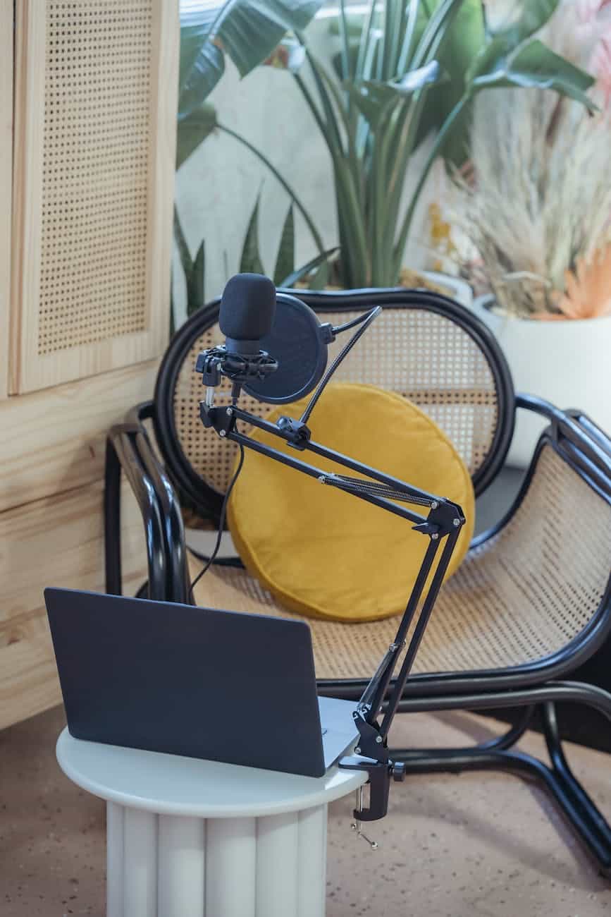 laptop and mic on tripod in studio before recording vlog - Digital Media Career Options